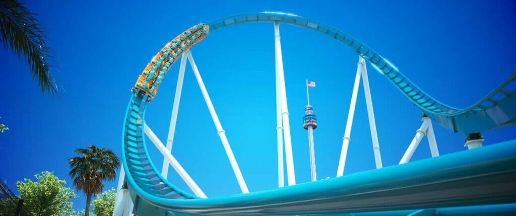 concept image of seaworld new roller coaster soaring over a high banked turn