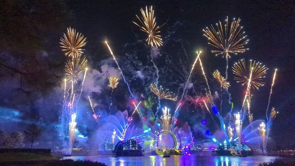 Fireworks explode over World Showcase Lagoon in one of the daily showings of HarmonioUS