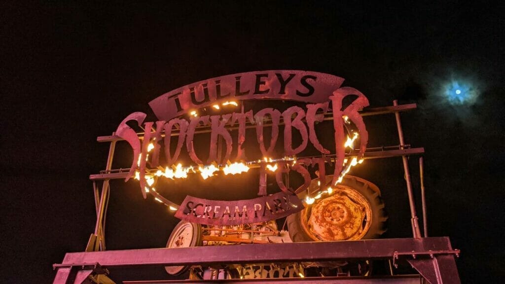 Tulleys Shocktober Fest sign backlit by fire