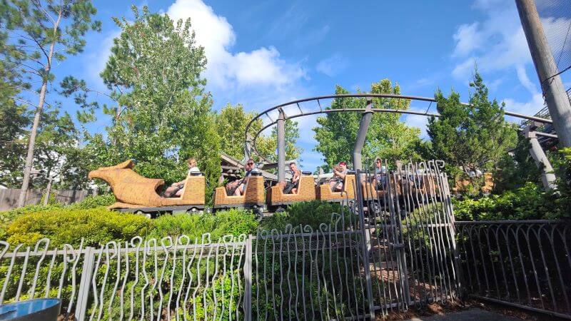 Riders coming back into the station after riding Flight Of The Hippogriff