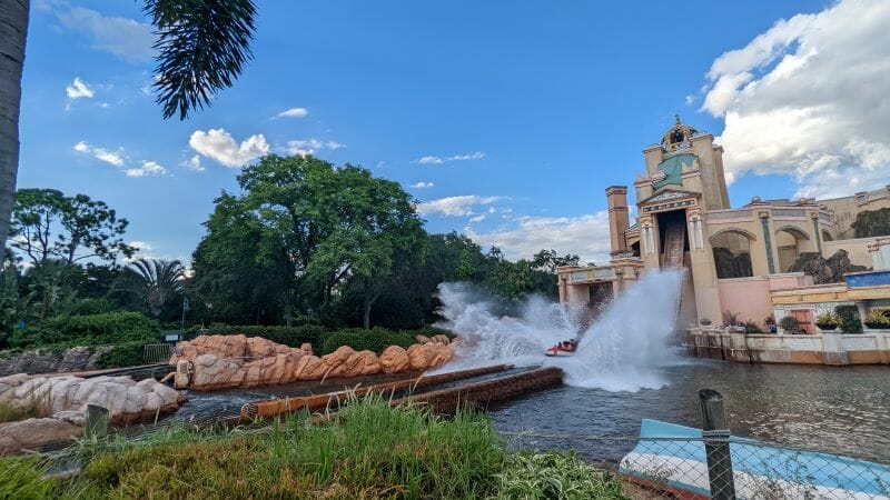 Riders splash down on Journey To Atlantis' largest drop before the roller coaster finale