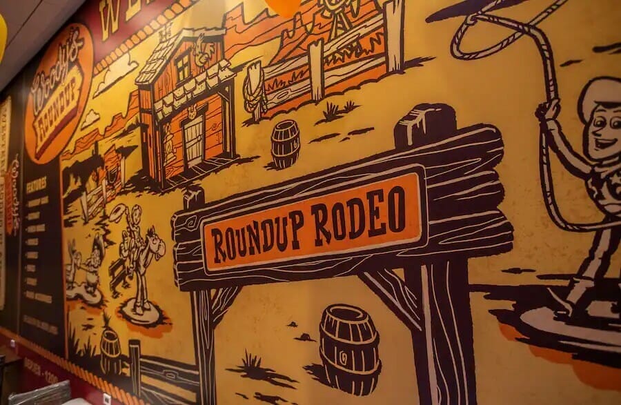 Wall inside Roundup Rodeo BBQ showing the name of the restaurant