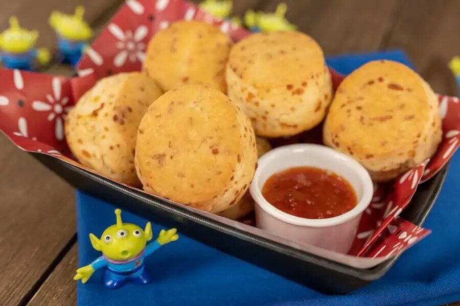 Roundup Rodeo BBQ Cheese Cookies in a basket with sweet chili sauce