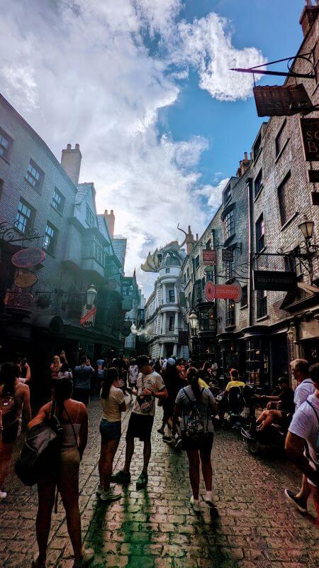 Crowds in Diagon Alley in Universal Studios Florida waiting got the Dragon Fire effect.