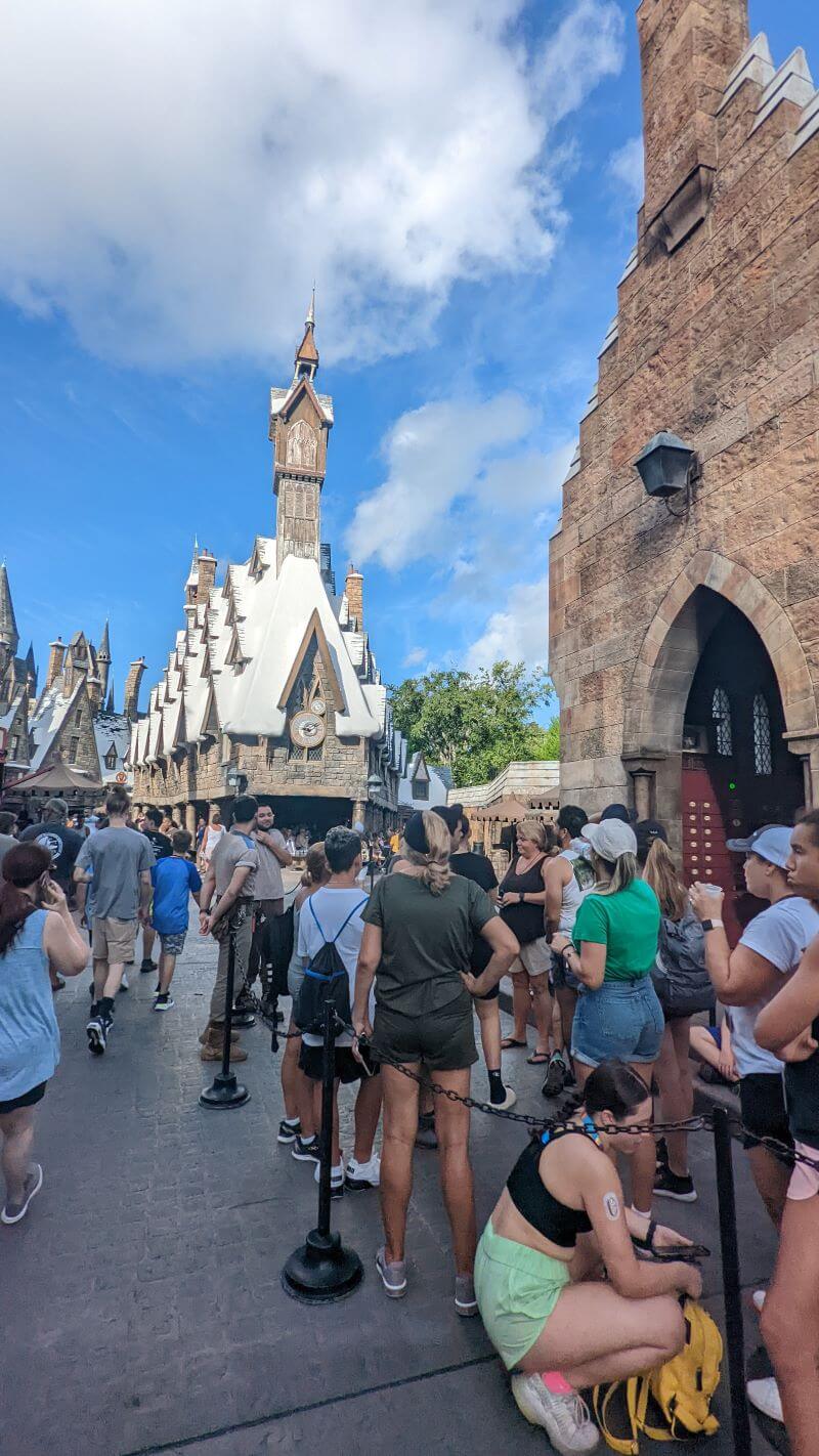 Queues of riders waiting for lockers to become available at Hagrid's Magical Creature Motorbike Adventure after early entry