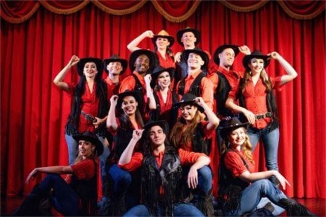 Country nights live posing together holding their cowboay hats in a promotional image for the show