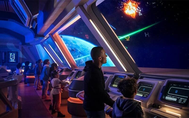 Concept art showing a family enjoying the flight deck in Star Wars: Galactic Starcruiser