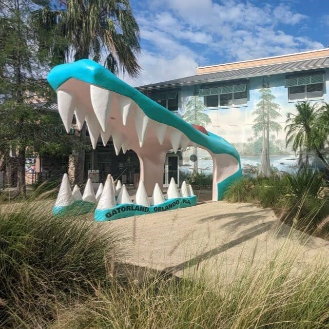 The world famous open alligator mouth entrance to Gatorland on a bright sunny Florida afternoon