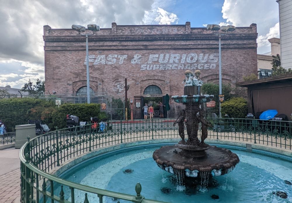 Fast & Furious main entrance behind an ornamental fountain.