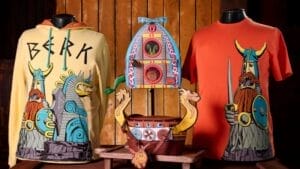 Official How To Train Your Dragon Isle Of Berk Merchandise has playful t-shirts and long sleeve tops bearing the film's characters set either side of a Viking helmet, also for sale in the new land.